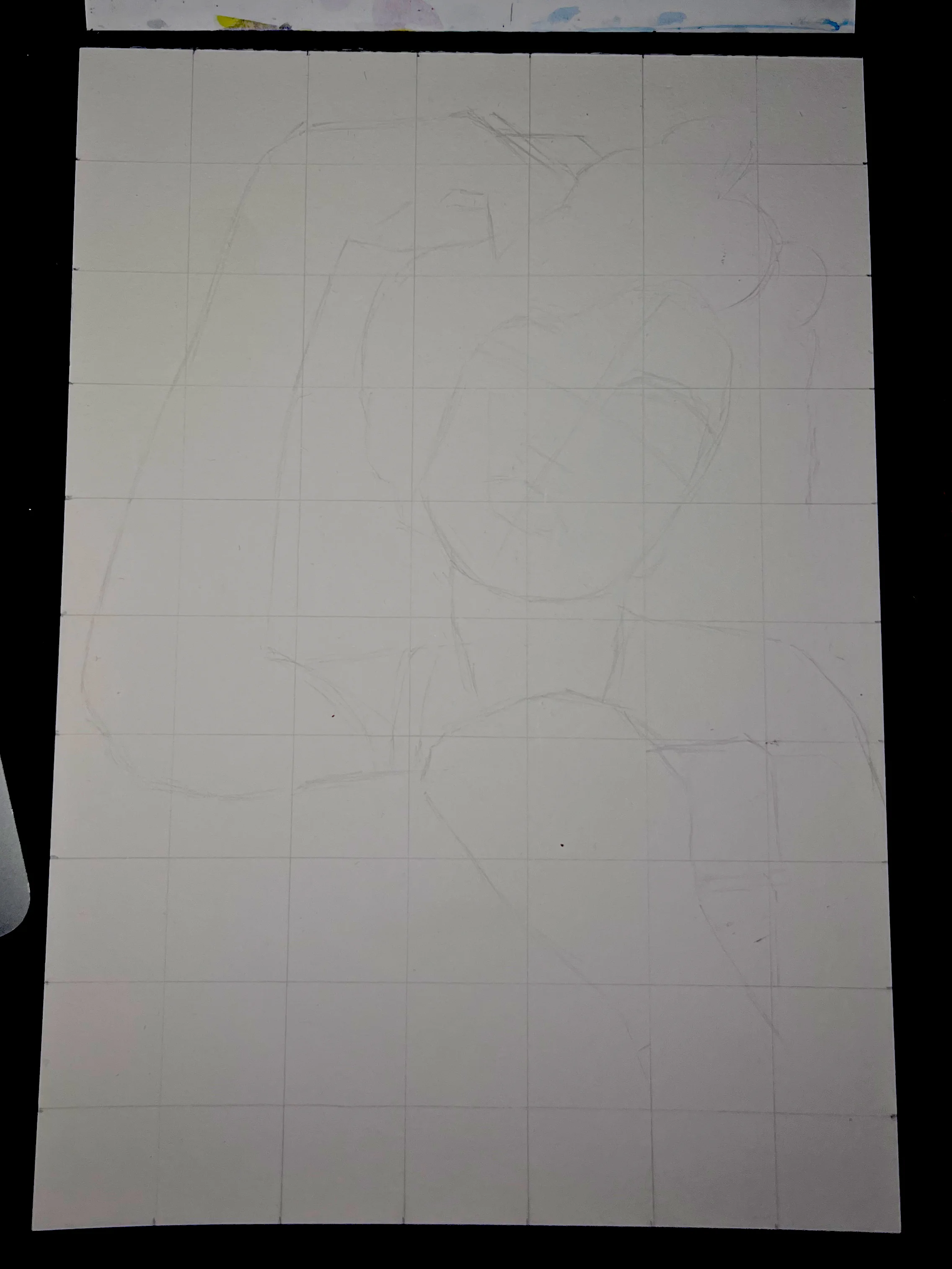 Initial stage of the portrait drawing showing the basic shapes mapped out with the grid